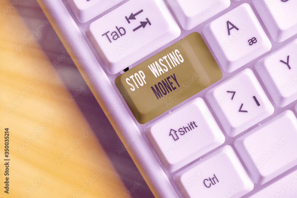 Aufkleber writing note showing stop wasting money. business concept for advicing an individual or group to sta