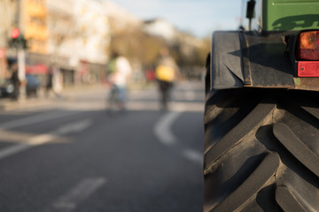 Tractor during a farmer protest in Hamburg, Germany on a sunny day - obrazy, fototapety, plakaty