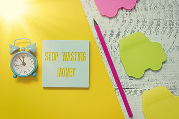 Text sign showing Stop Wasting Money. Business photo showcasing advicing an individual or group to...