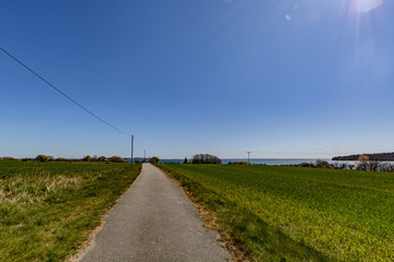 Fototapeta na wymiar Muglitz auf Rügen, Blick zur Insel Vilm
