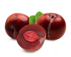 red cherry plum with green leaves isolated on white background