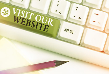 Writing note showing Visit Our Website. Business concept for visitor who arrives at web site and...