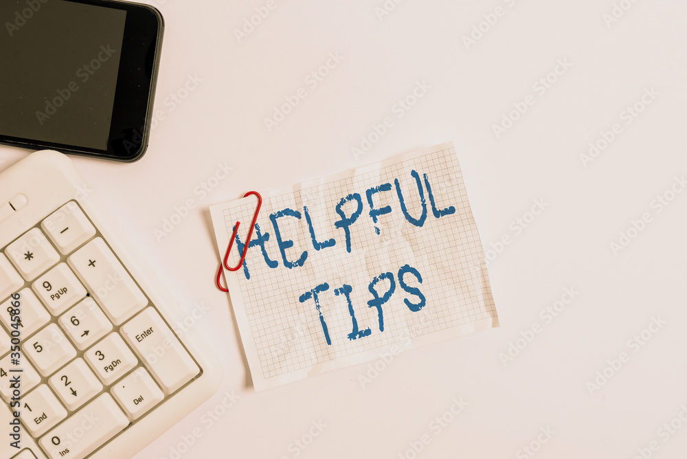 Poster handwriting text helpful tips. conceptual photo advices given to be helpful knowledge in life white 