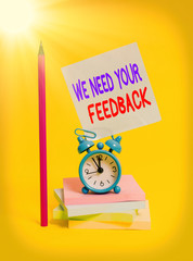 Conceptual hand writing showing We Need Your Feedback. Concept meaning criticism given to say can...