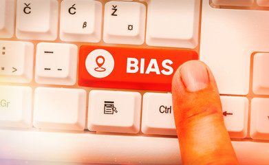 Conceptual hand writing showing Bias. Concept meaning inclination or prejudice for or against one...