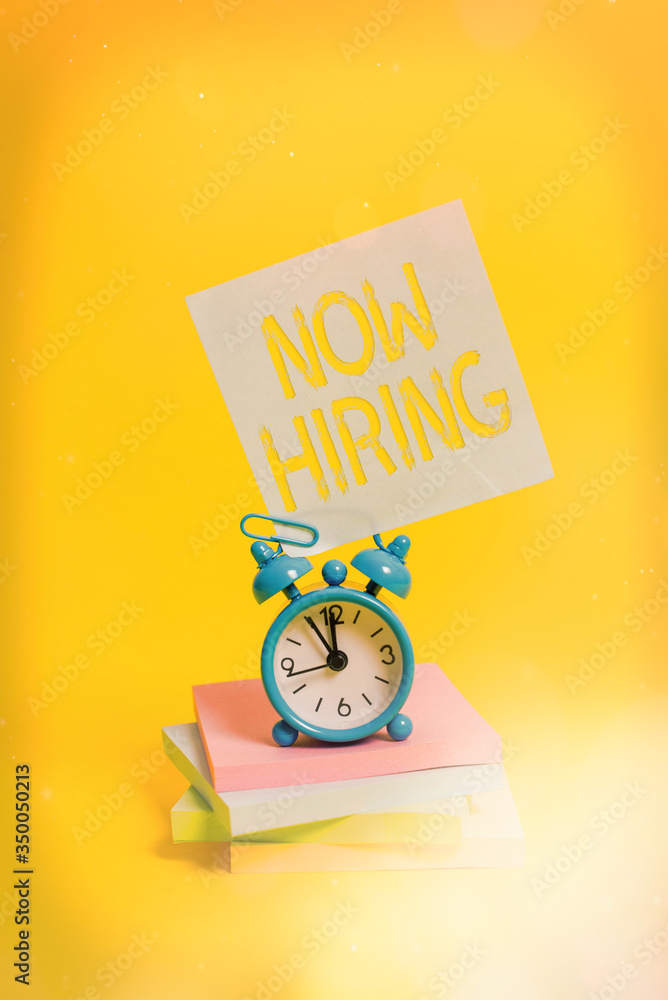 Poster handwriting text now hiring. conceptual photo finding evaluating working relationship with future em