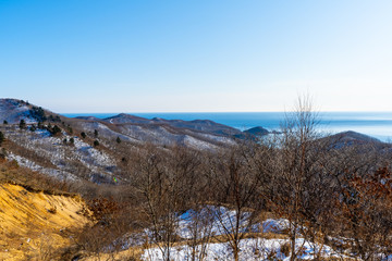 Mountain landscape with a view of the sea.