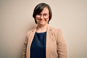 Young down syndrome business woman wearing glasses standing over isolated background with a happy...