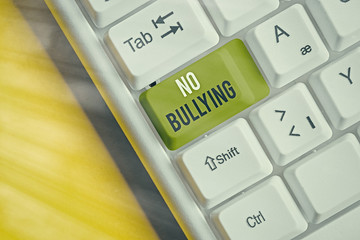 Writing note showing No Bullying. Business concept for stop aggressive behavior among children...