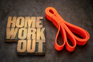 home workout and fitness concept with resistance band