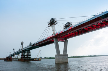 Russia, Blagoveshchensk, July 2019: Bridge on the Amur river from Blagoveshchensk to the Chinese city of Heihe in summer
