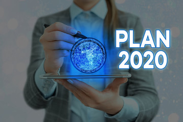 Writing note showing Plan 2020. Business concept for detailed proposal doing achieving something...