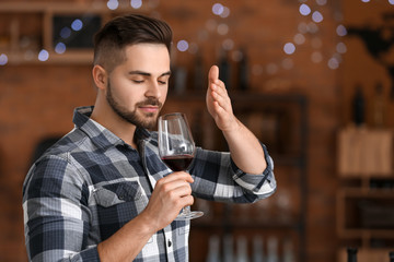 Man tasting wine at the restaurant