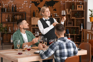 People tasting wine at the restaurant