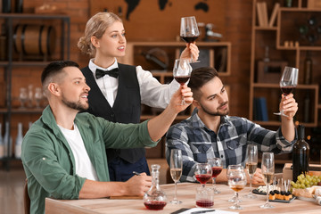 People tasting wine at the restaurant