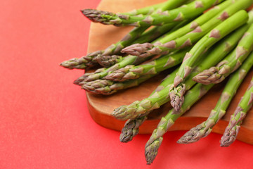 Fresh asparagus on color background