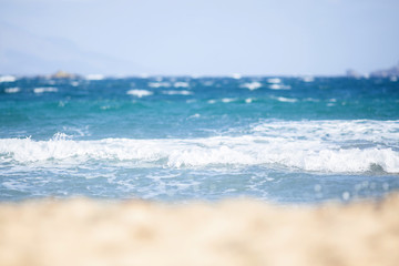 close up on white sand and sea waves travel background