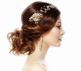 adorable young bride with gorgeous diadem in her hair