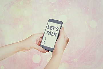 Writing note showing Let S Talk. Business concept for they are suggesting beginning conversation on...
