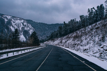 Snowfall on the road on the pass