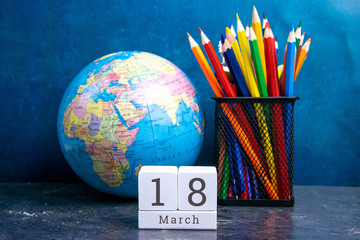 March 18 on the wooden calendar.The eighteenth day of the spring month, a calendar for the...