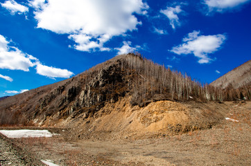 cliff above the road