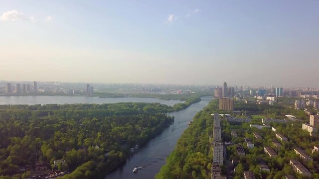 Aerial view in the area of Mitino, North and South Tushino, Pavshino, Silver Boron Park. Moscow River Canal, a view of the cityscape.