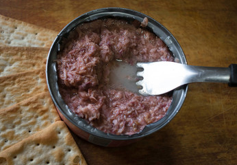 can of crumbled tuna with water biscuits