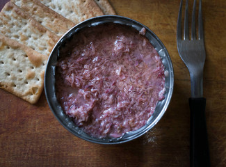 can of crumbled tuna with water biscuits