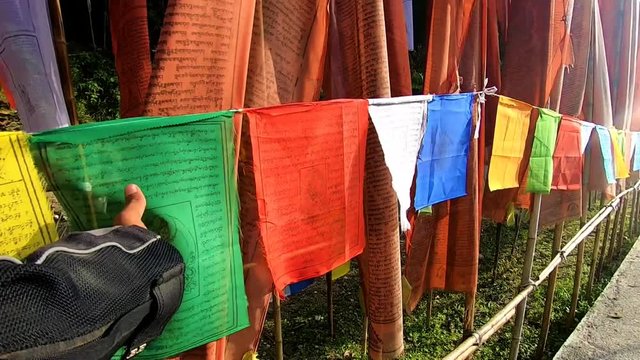 buddhist religious colorful flags hoisted