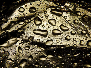 Drops of water on a metal surface. Texture. Background. Macro shot.   