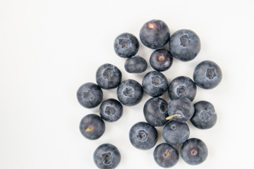 Fresh blueberry berry on a white background. Selective focus