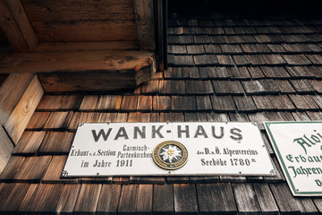 Garmisch-Partenkirchen, Germany - September 22nd 2015: Sign on the side of the Wank-Haus at the top of the wank mountain