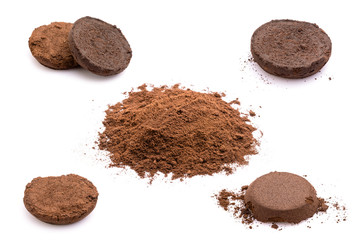 Ground coffee from coffee machine isolated on white background