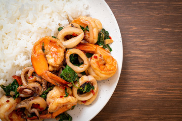 rice and stir-fried seafood with Thai basil