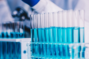 Laboratory Tube With sampling of Virus corona covid 19 vaccine. Scientific Lab equipment Close-Up. Concept of Pandemic Disease and Healthcare Vaccine.