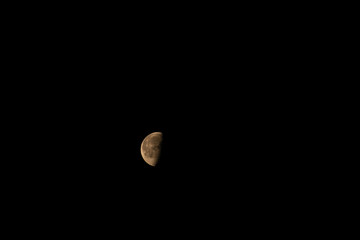 Close-up photography of the waning moon with its main craters