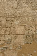 Egyptian ancient hieroglyphs on the stone wall