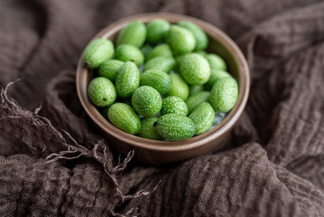 Cucamelons or mouse melons. Freshly harvested cucamelons, Mexican sour gherkin pepquino or mouse melon. Sour grape size cucumbers. 
