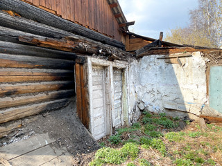 Fototapeta na wymiar View of the demolition of wooden building.