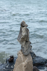 The wish stone around the temple in the sea.