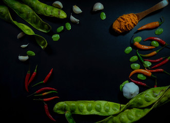 Vegetable with spicy ingredient flat lay with space for text, Thai cooking on black background