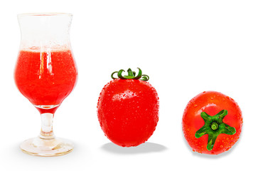 Ripe fresh tomatoes and tomato juice in glass isolated on the white background