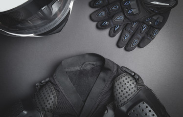 Fototapeta Helmet, gloves, jacket. Motorbike safety clothing obraz
