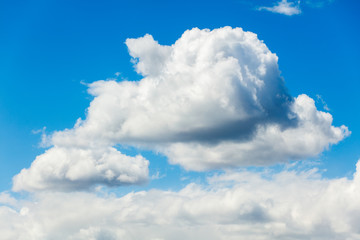Naklejka na ściany i meble Panoramic fluffy clouds in the blue sky