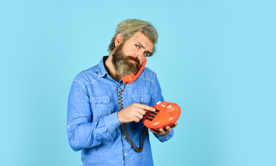 Smart ideas. Man talking to vintage phone. businessman talking on vintage phone. buy new gadget. phone business concept. Businessman touts retro phone. Retro customer service. communication