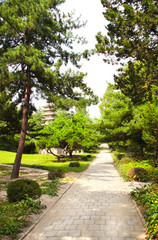 Stone buddhist pagoda in ornamental garden, Kesson, North Korea