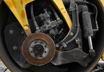 industrial background - close-up road roller hydraulic motor