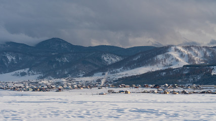 Landscape mountain village covered with snow
