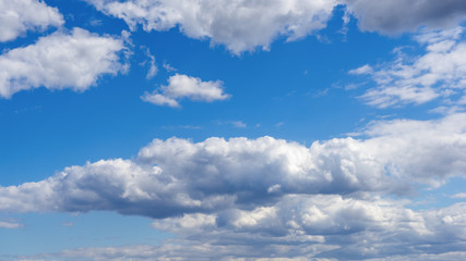 Naklejka na ściany i meble Beautiful blue high sky with clouds and copy space.